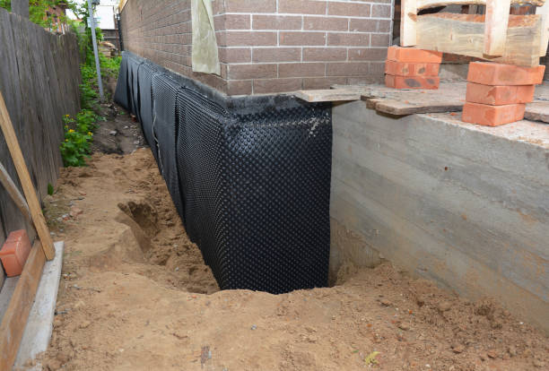 Happy homeowners after waterproofing job in Tullahoma